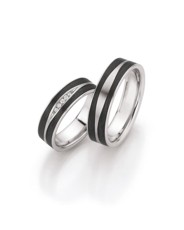 Trauringe von Fischer in Weißgold mit Carbon und 5 Brillanten.
