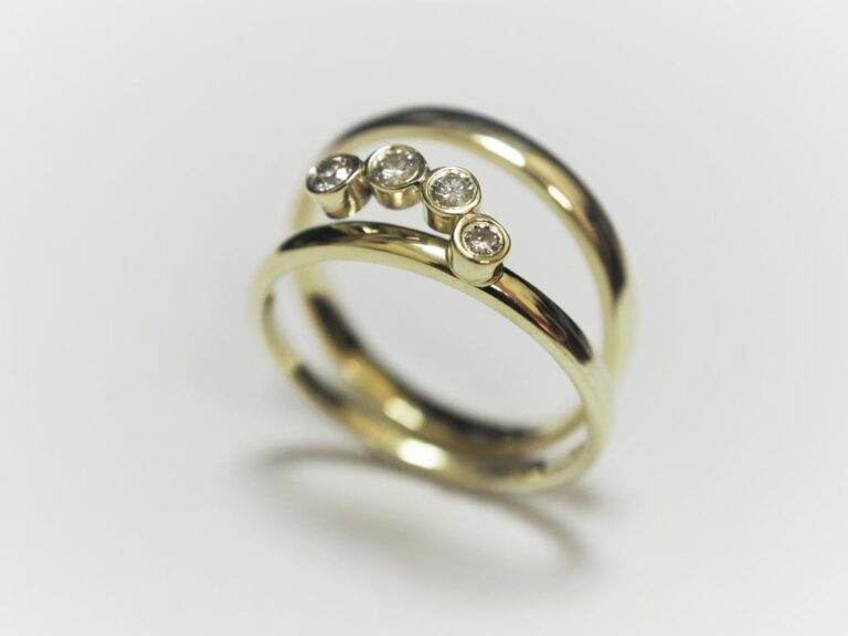 Trauringumarbeitung mit mehreren Brillanten