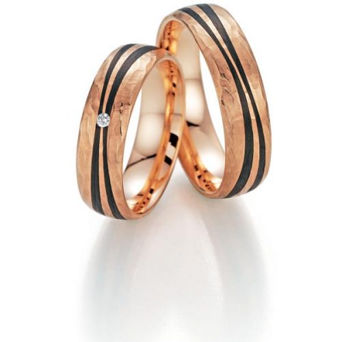 Trauringe von Fischer in Rosegold mit Carbon und 1 Brillant.